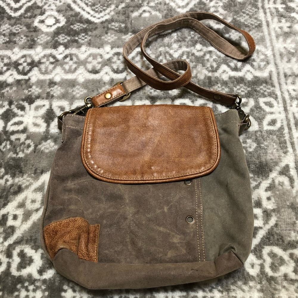 Crossbody canvas and leather travel bag